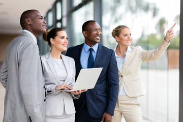 Fototapeta premium group of corporate workers discussing work