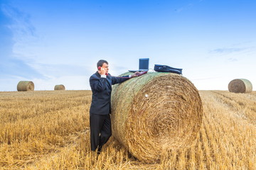 Contemporary businessman farmer in the landscape