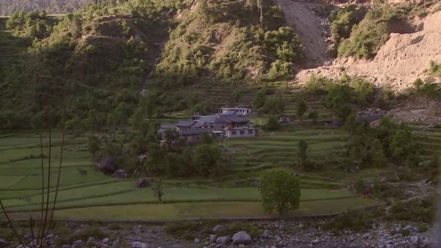 Homes at the base of mountains in India