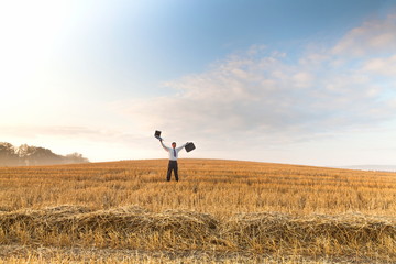 Contemporary businessman farmer in the landscape