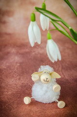 Easter sheep and snowdrop