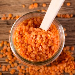 Top view on glass dose with red lentils