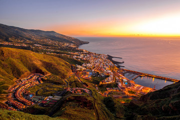 Aerial view on illuminated Santa Cruz city on the dusk on La Palma island in Spain - obrazy, fototapety, plakaty