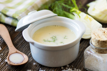 Creamy fennel soup with fresh herbs - 104522319