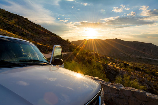 A White SUV Parked With Door Open At A Scenic Overlook In South Mountain Park.  Phoenix, Arizona.