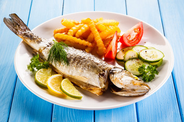 Fish dish - fried fish fillet with vegetables 