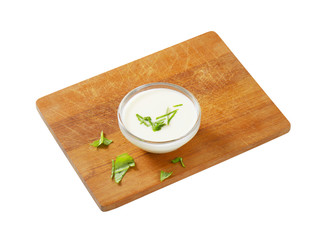 Bowl of white salad dressing