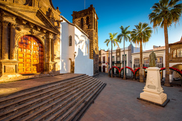 Central square in old town with Salvador church and monument in Santa Cruz de la Palma in Spain