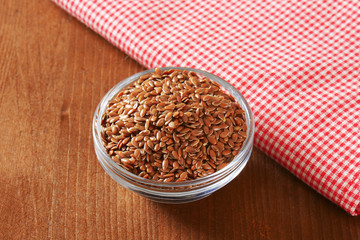 Bowl of whole brown flax seeds