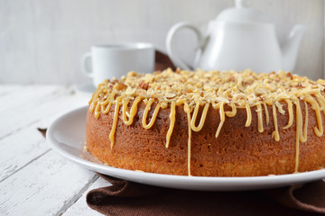 Cake with caramel, condensed milk and hazelnuts