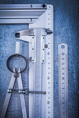 Metal ruler try square slide caliper construction pair of compas © mihalec