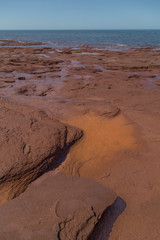 Orange Layered Rock at Cavendish Beach