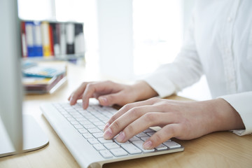 Woman hands on keyboard