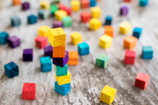 Colorful wooden building blocks. Selective focus