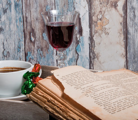 Fototapeta a good book and a glass of wine obraz