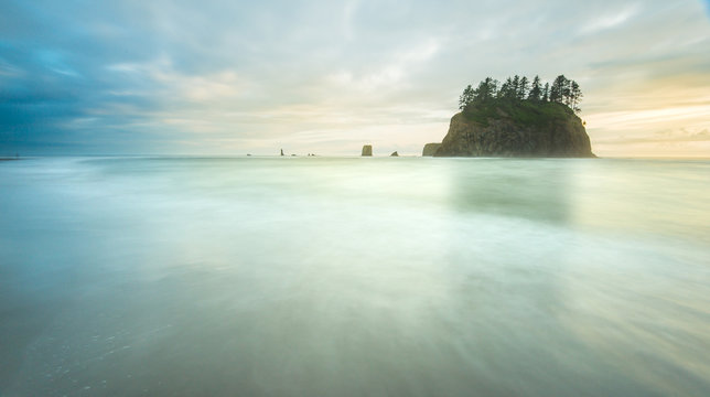 Fototapeta scenic view of sea stack in Second beach when sunset,in mt Olympic National park,Washington,usa.