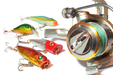Fishing reel with hand made wobblers for fishing