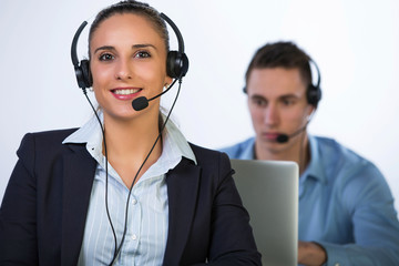 Portrait of happy smiling cheerful support phone operator in headset, isolated on white background