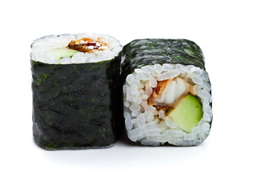      Two sushi maki rolls close up with eel and cucumber   on white background 