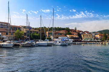 Fototapeta na wymiar Boat harbor in Corfu Town in Greece