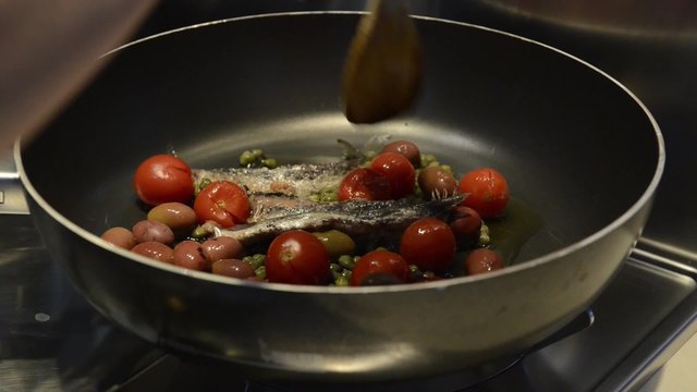 Pomodori e acciughe
