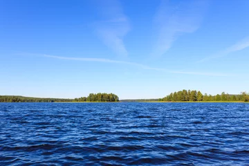 Foto op Plexiglas Meerlandschap in Finland op een zonnige dag © Juhku