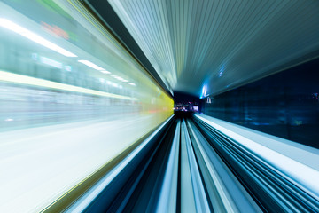 Fototapeta na wymiar Train moving fast in tunnel