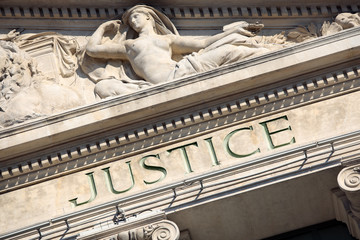 Justice sign on a Courtroom Building.