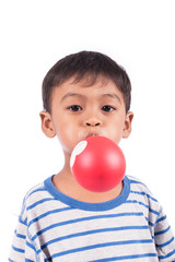 little happy boy blow up balloon