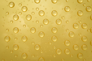 water drop on gold background