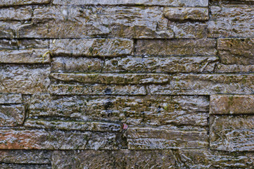 Brick wall and water flow.