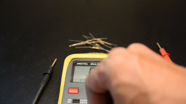 Measure the resistance of the resistor with digital meter.