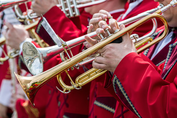 trumpet players at music festival of street brass bands