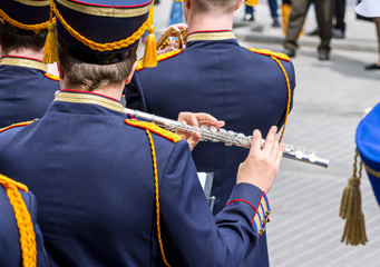 military musician playing on flute