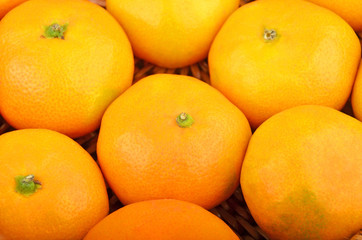 Mandarin on wickered background