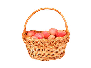Red apple in a wattled basket