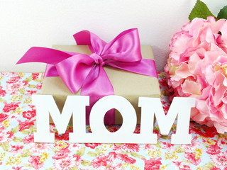 gifts and beautiful bouquet of flowers for mom for mother day or birthday