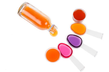 Syrup Medication Bottles and Medicine in Spoons on white backgro