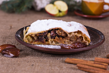 Apple strudel or apple pie  with dates and cinnamon