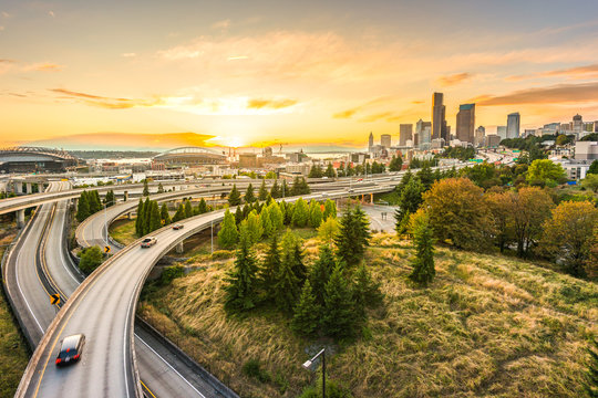Seattle skylines and Interstate freeways converge with Elliott Bay,Seattle,Washington,usa.