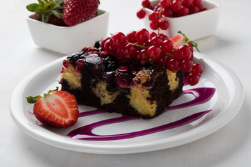 fruit cake with currant and strawberries