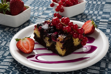 fruit cake with currant and strawberries