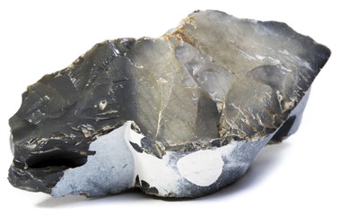 Black flint stone isolated on white background