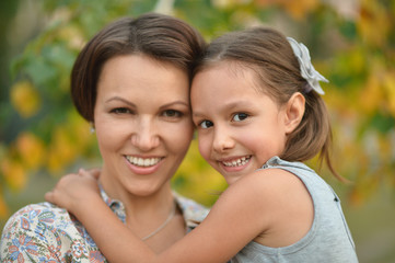 girl with mother in park