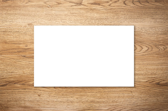white blank name card on wooden background
