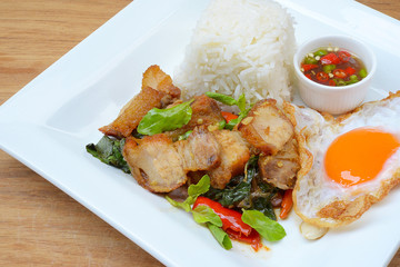 Rice topped with stir-fried pork and basil
