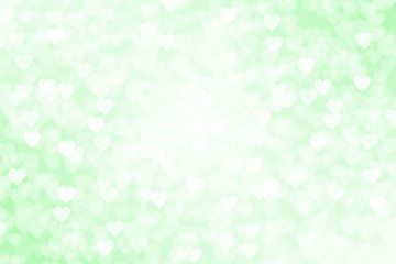 ハートのパターンと中央に円形の白いボケ　グリーンイメージ