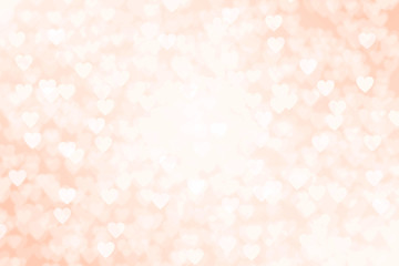 ハートのパターンと中央に円形の白いボケ　オレンジイエローイメージ、