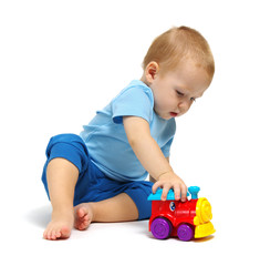 Little boy playing toy