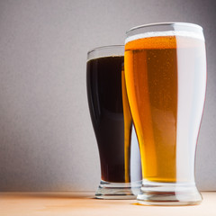 Glass of light and dark beer